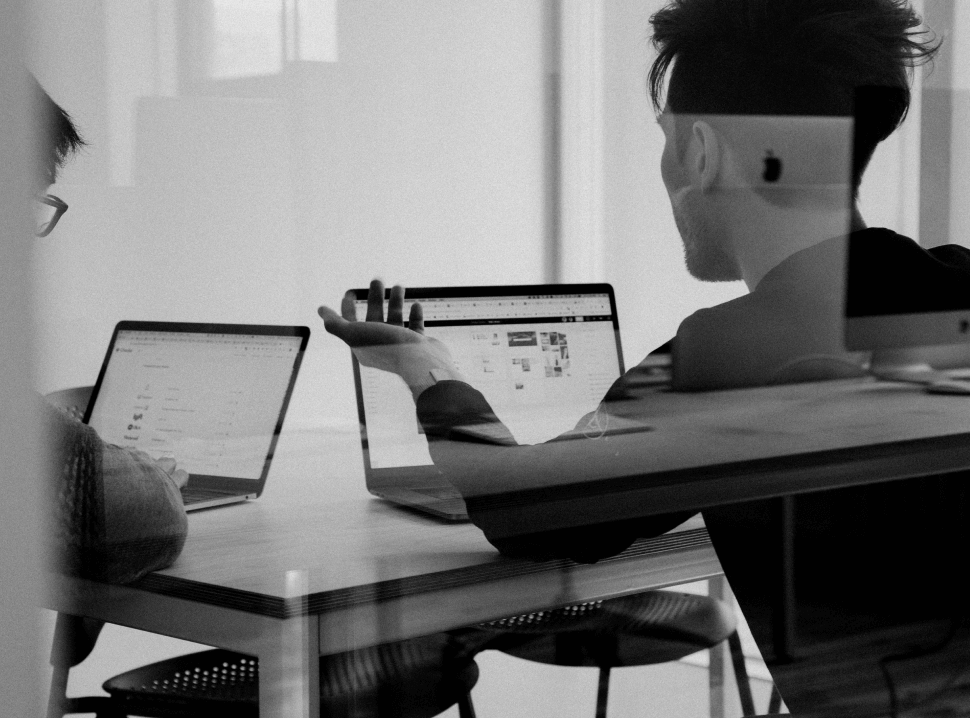 people discussing over a laptop